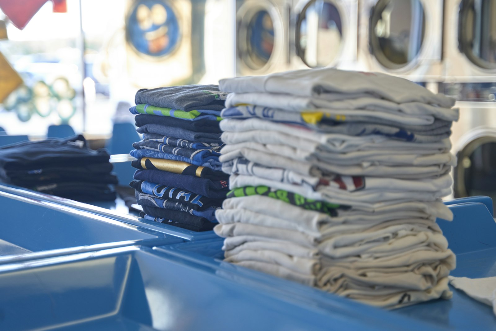 A neat stack of freshly folded shirts